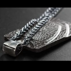 William Henry P33 Damascus Forge Pendant